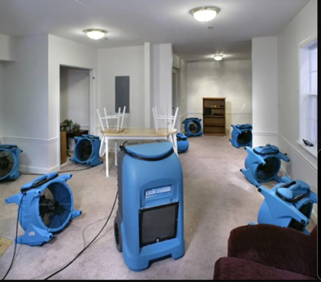 Air movers and dehumidifier setup for Water Extraction & Removal in Rome